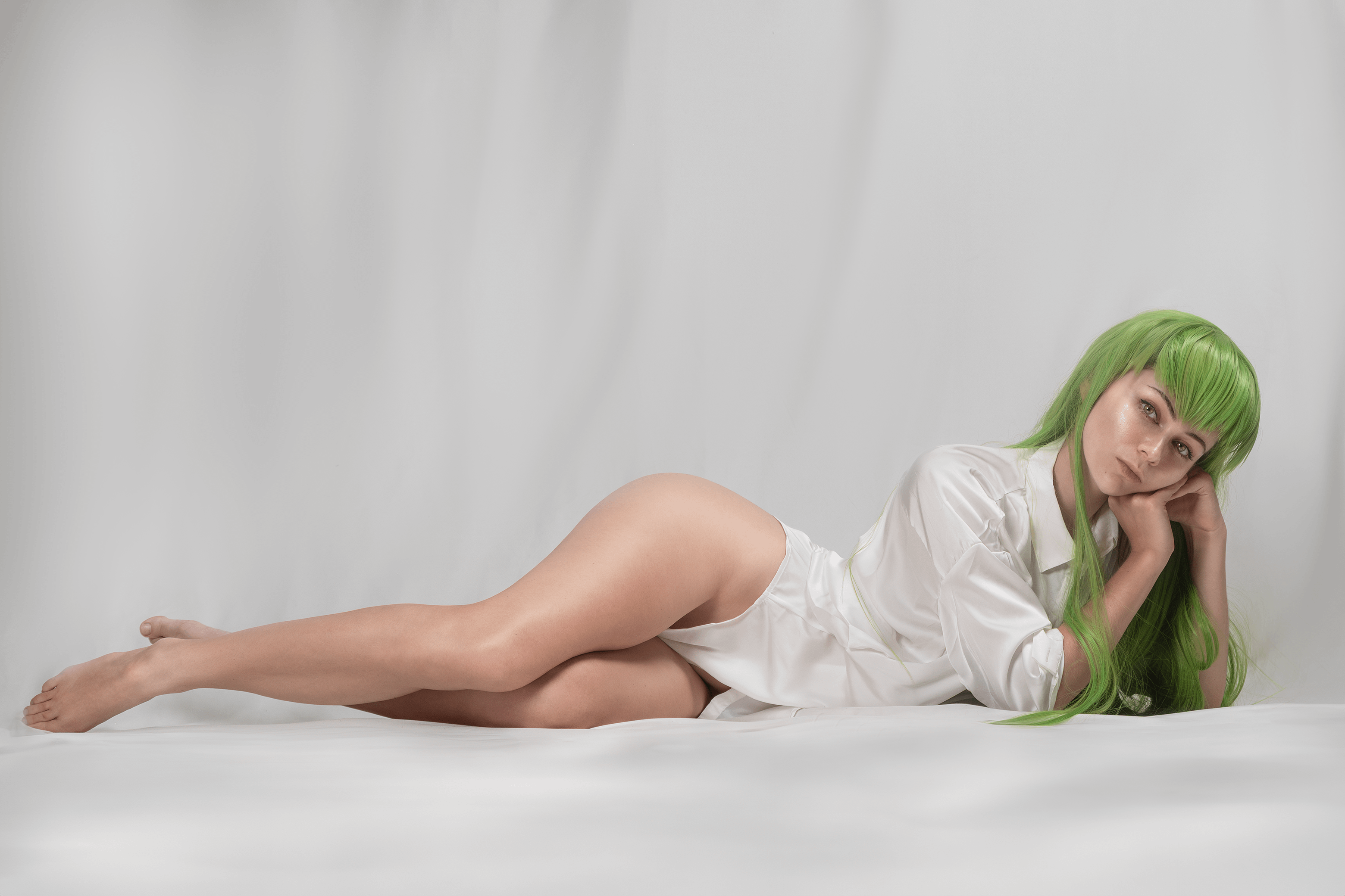 Nancy Novikova Embodies C.C. in a Seductive Code Geass Cosplay